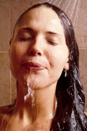 Sexy babe is taking shower alone photo 3