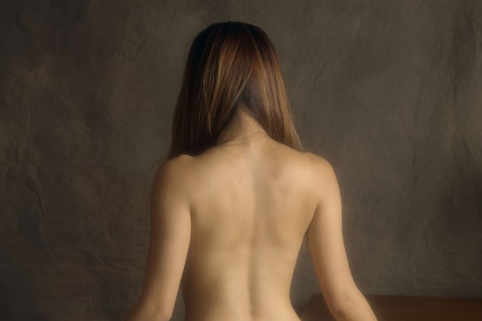 Asian brunette is showing her sweet tits photo 14