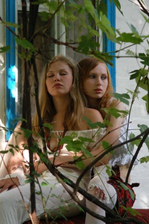 Gentle ladies are touching each other photo 11