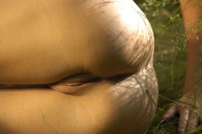 Blonde gal showing off in the forest photo 1