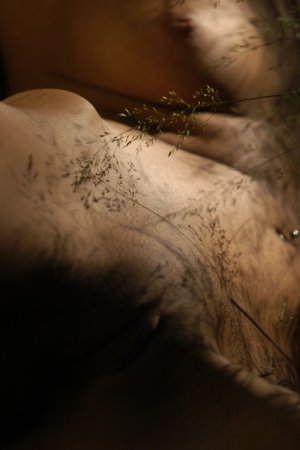 Blonde gal showing off in the forest photo 4