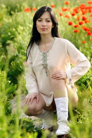 Luxurious brunette among wonderful flowers photo 16