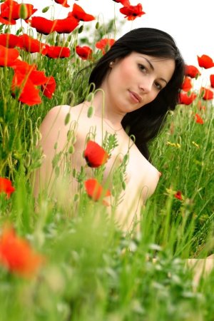 Luxurious brunette among wonderful flowers photo 17