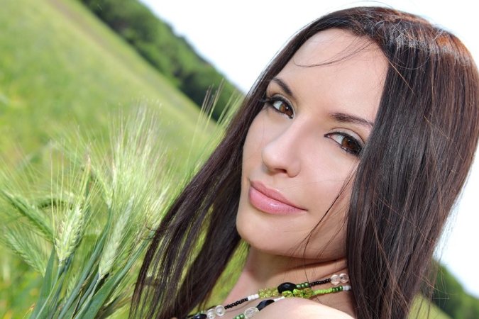 Gentle brunette is having solo outdoors photo 10