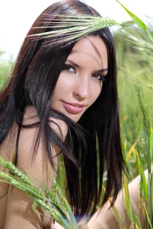 Gentle brunette is having solo outdoors photo 13