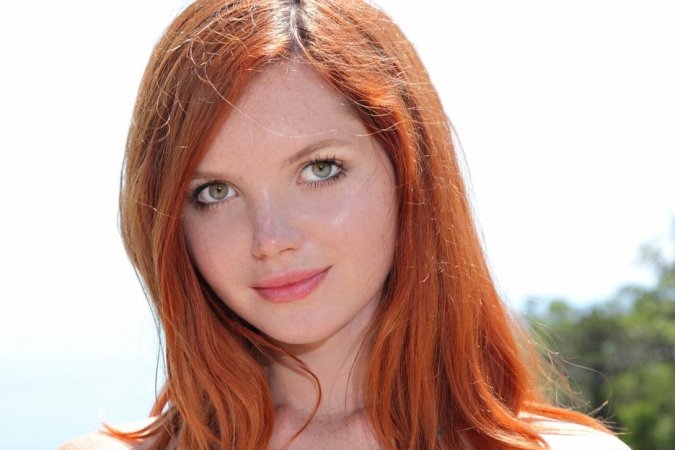 Ginger chick takes off clothes on the mountain. photo 11