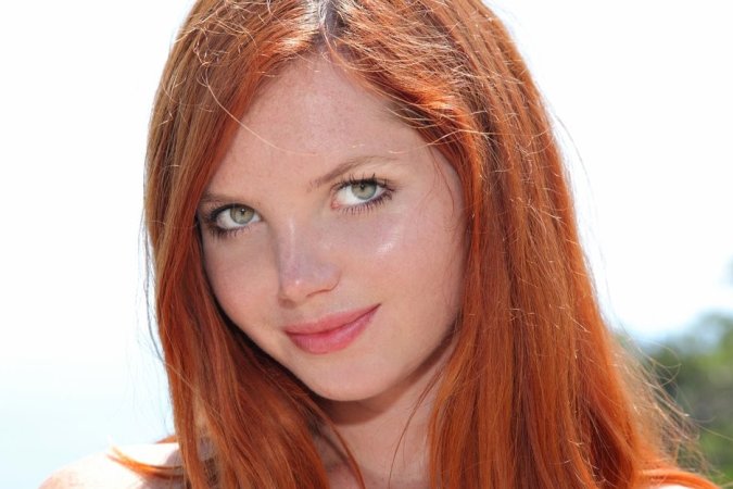 Ginger chick takes off clothes on the mountain. photo 12