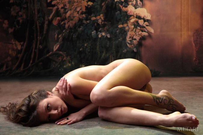 Saucy hottie enjoys getting naked photo 2