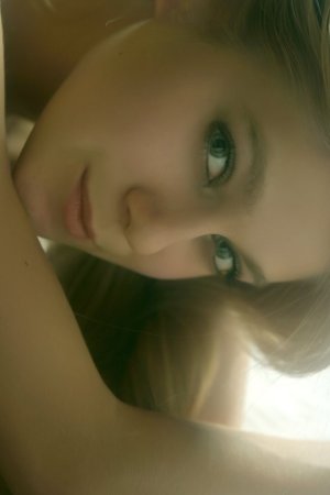 Yummy cutie gets orgasm in her bed photo 14