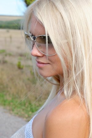 Blonde is enjoying passionate solo in the evening photo 13