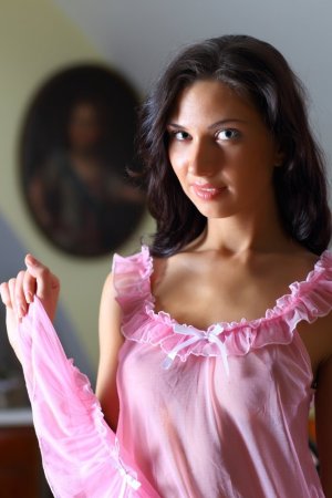 Skinny lady in pink performs striptease. photo 17