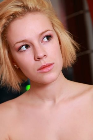 Hot blonde loves showing striptease skills photo 19