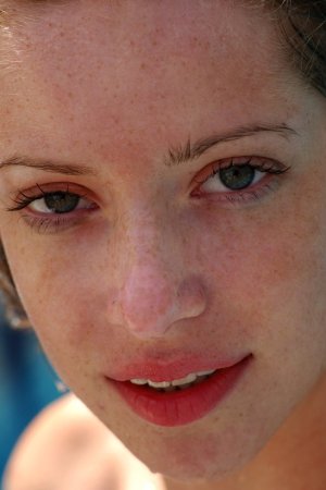 Sweet blonde is having sweet solo in the pool photo 20