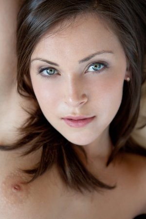 Sexy brunette is showing solo skills photo 2