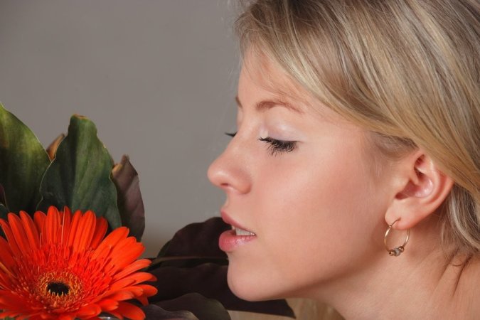 Blonde is holding the flower and touching herself photo 3