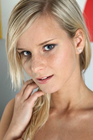 Wonderful blonde is touching sweet boobs photo 3