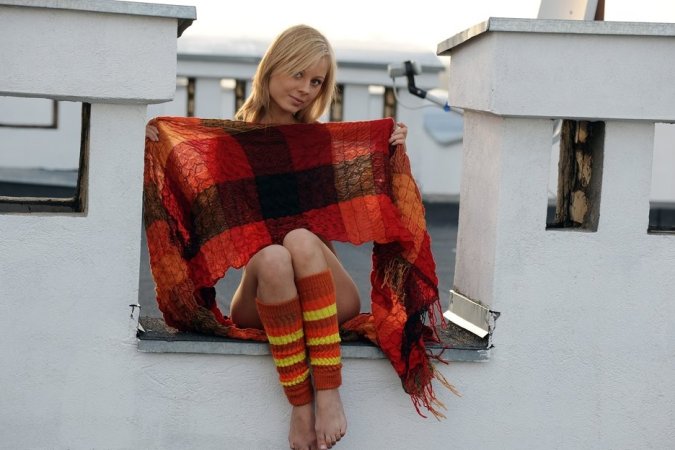 Sweet teen is having solo on the roof photo 1