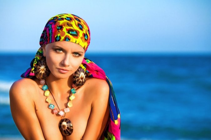 Hot lady in colorful bikini is having solo on the beach photo 10