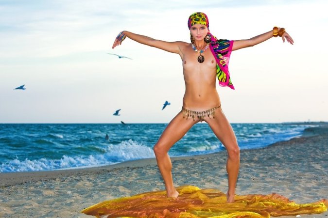 Hot lady in colorful bikini is having solo on the beach photo 13