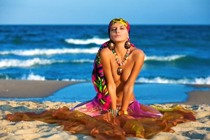 Hot lady in colorful bikini is having solo on the beach photo 19