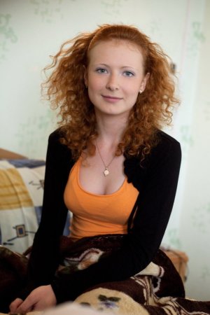 Redhead babe is enjoying sweet solo photo 3