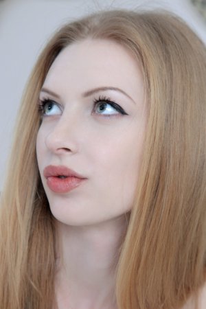Sophisticated blonde is enjoying solo session photo 9