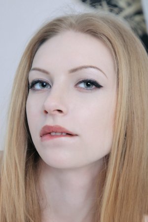 Sophisticated blonde is enjoying solo session photo 14