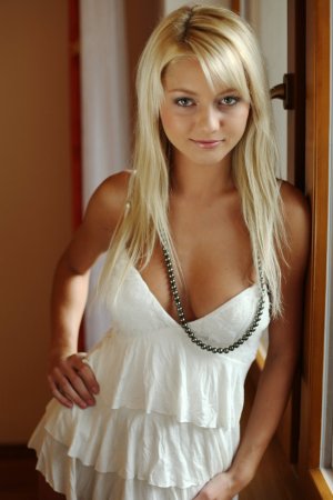 Wonderful blonde is touching her body photo 15