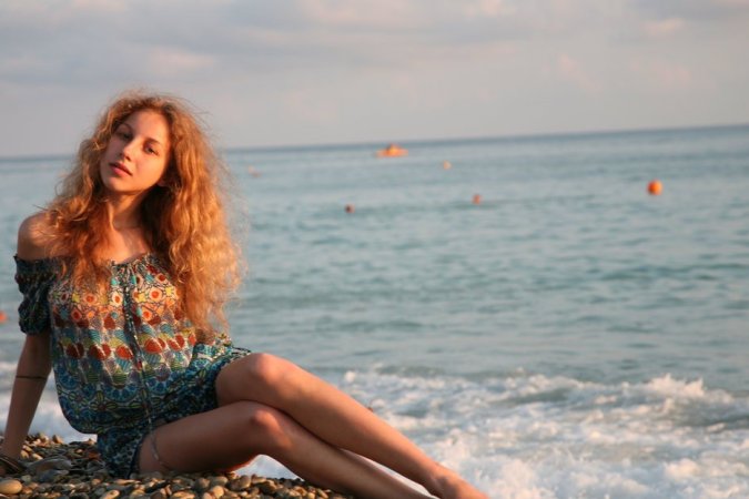 Sweet model is demonstrating awesome solo skills photo 4