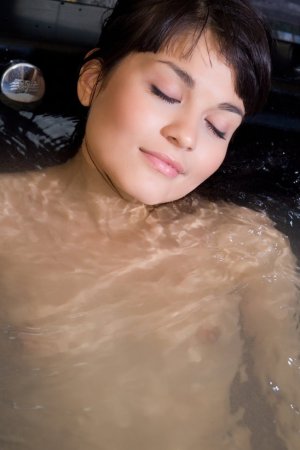 Cutie gets orgasm in warm water photo 17