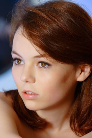 Busty mdemoiselle in red is touching herself tenderly photo 18