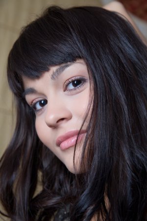 Brunette opens hairy pussy on camera. photo 19