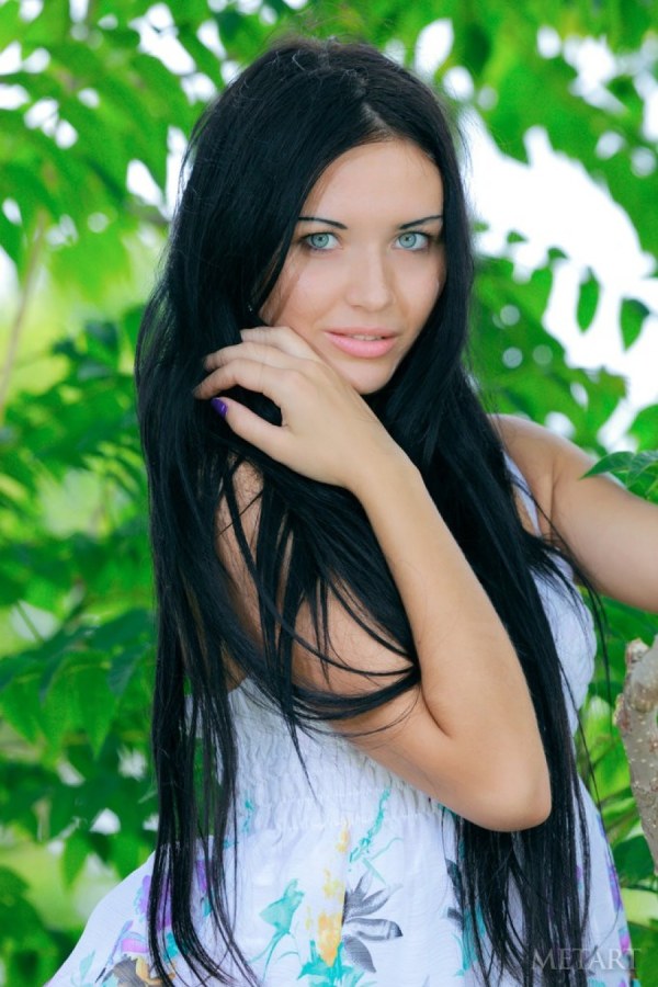 Kitti A – Brunette allows breeze to caress her hairy pussy