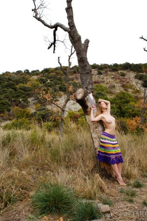 Hot blonde is having solo outdoors photo 12