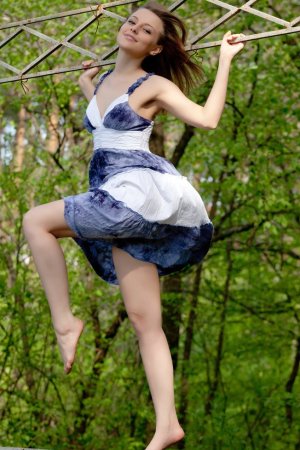 Sexy girl is enjoying solo among beautiful flowers photo 6