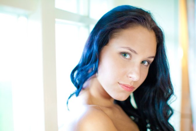 Kinky brunette is getting naked with excitement photo 13