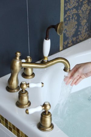 Sexy babe dives into a bath full of hot water. photo 19