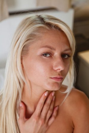 Petite blonde gal showing her sexy appeal photo 17