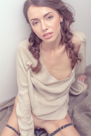 Brunette babe spreads her long legs. photo 14
