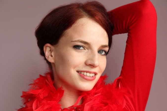 Elegant lady in red showing her sexy body photo 16