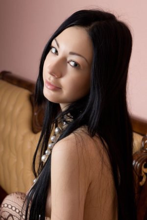 Naughty cutie caresses naked body with beads photo 4