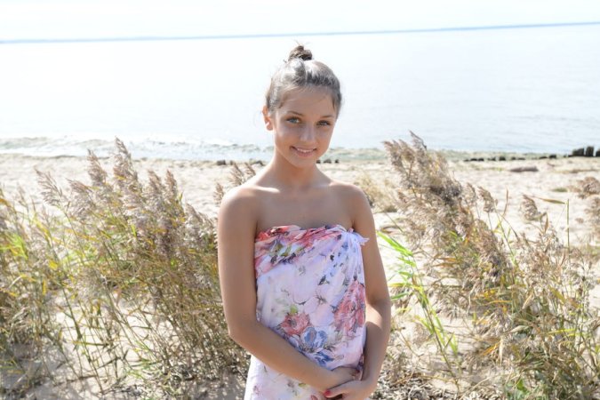 Gorgeous lady is having solo on the beach photo 19
