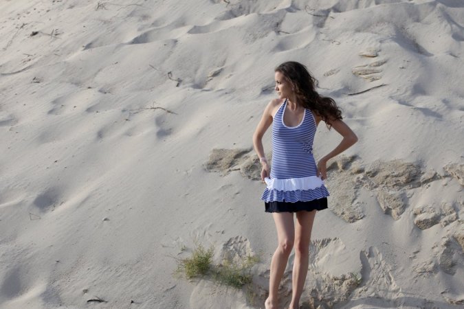 Lovely babe is enjoying solo on the beach photo 6