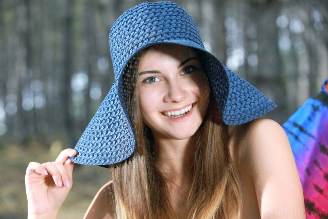 Big-tittied princess is enjoying sweet solo outdoors photo 17