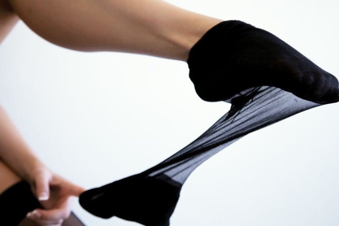 Her black stockings will drive you mad photo 8