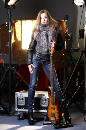 Amazingly hot blonde is playing the guitar photo 7