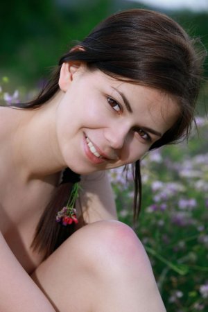 Cute brunette is touching her naked body outdoors photo 20