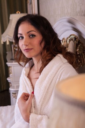 Beautiful girl is pleasing herself with excitement photo 5