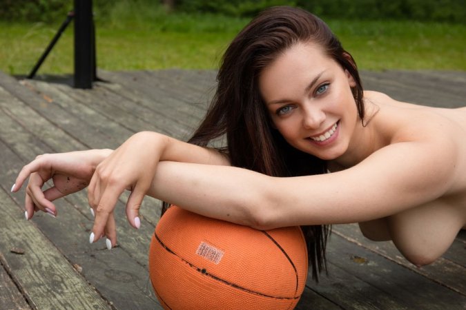 Brunette plays strip basketball outdoors photo 4