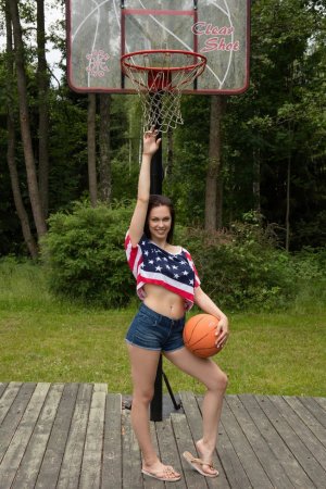 Brunette plays strip basketball outdoors photo 17